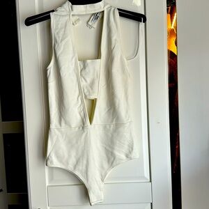 Never worn fashion nova body suit very sexy